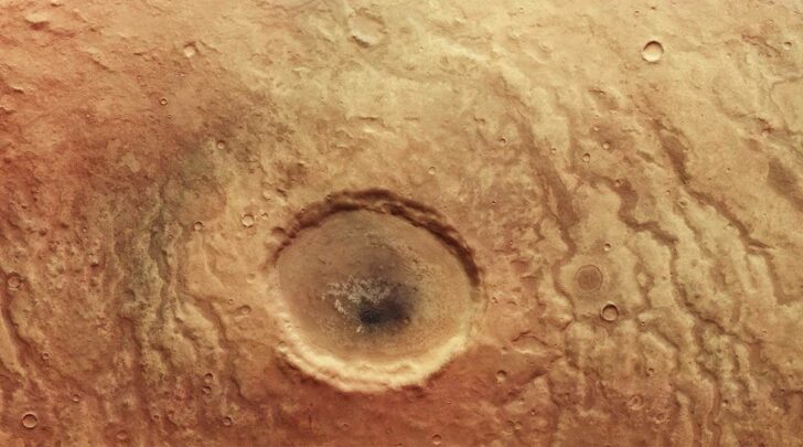 Take a look at this open-eyed crater on Mars